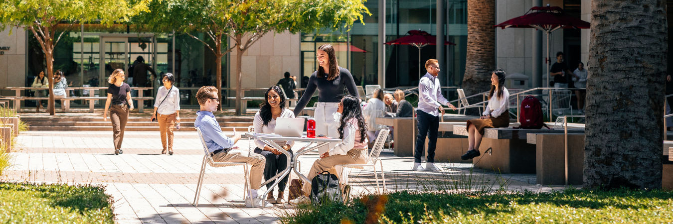 Leavey grad students meeting outdoors on campus