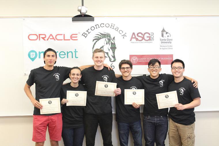 Alt text: Five people holding certificates labeled 