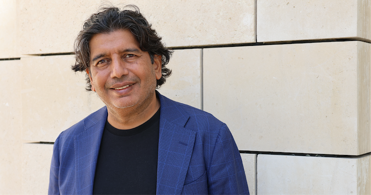 Dean Ravi Bapna outside Lucas Hall, home to the Leavey School of Business