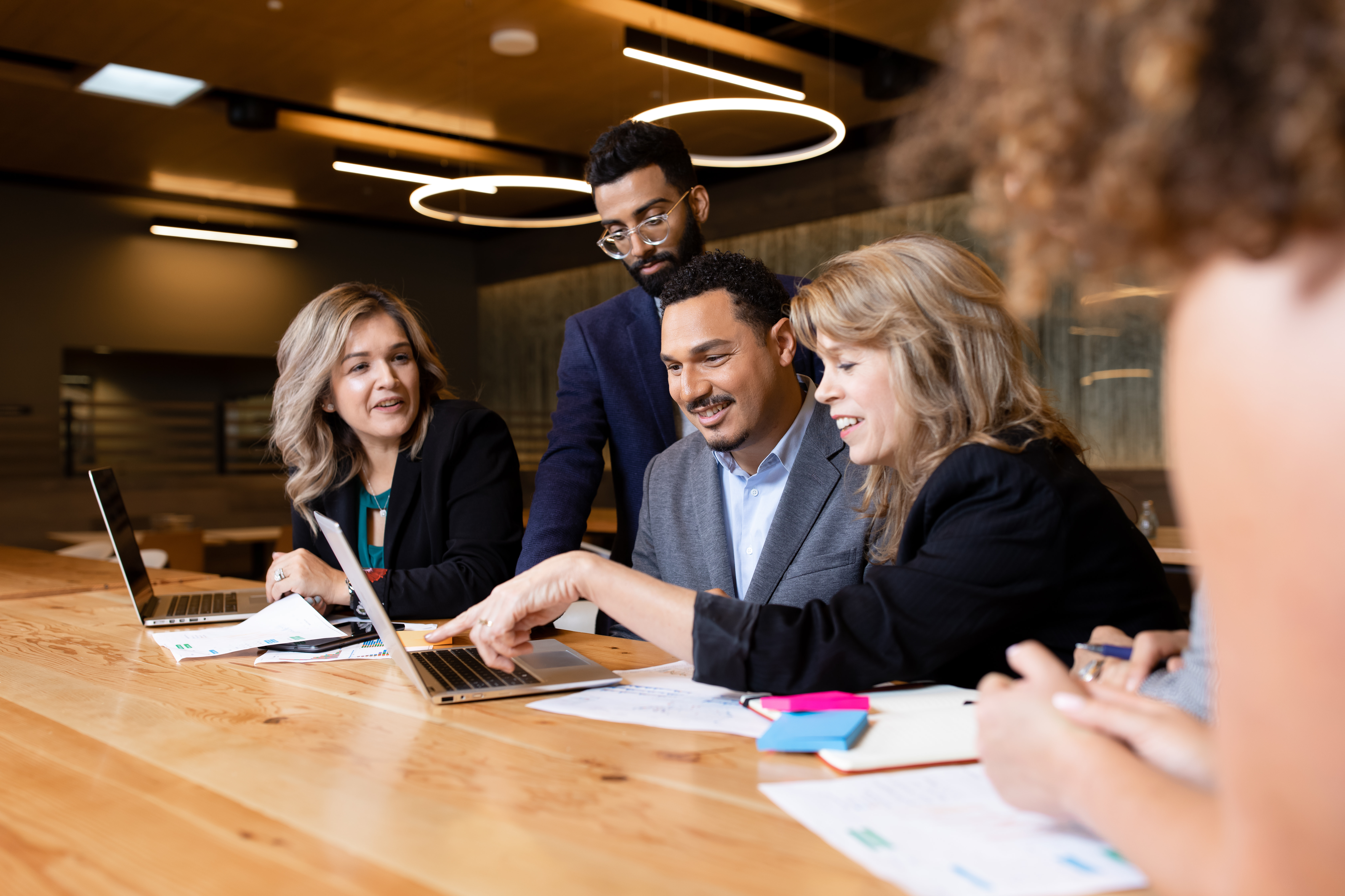 Leavey student collaborating over laptops