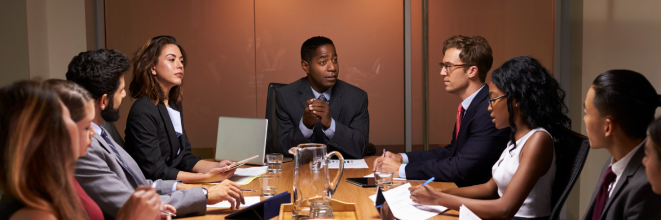 Boardroom of diverse professionals