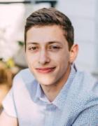 A person smiling outdoors, titled 'Netz, Jonny - Undergraduate'.