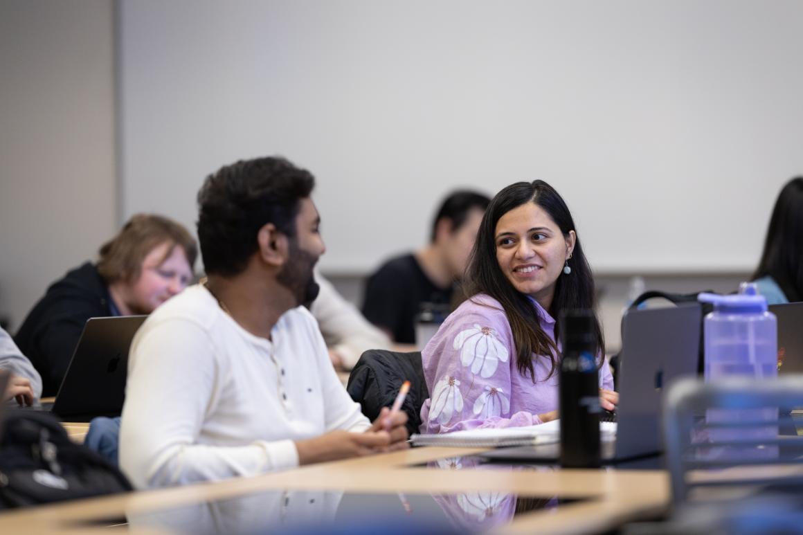 Leavey graduate students socializing during a break in class