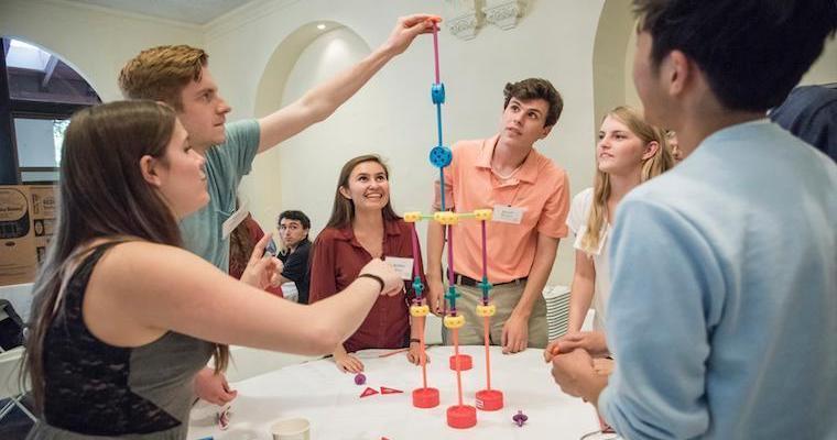Group of young people engaging in a team bonding activity.
