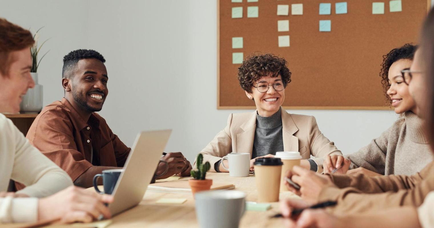 Fulfilled business professionals collaborating in a conference room