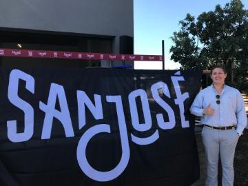 A person standing next to a 