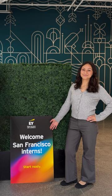 Jessica Simmons at the EY sign