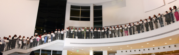 Photo of Feb 7, 2024 LBFSV MOBI graduates standing on a balcony