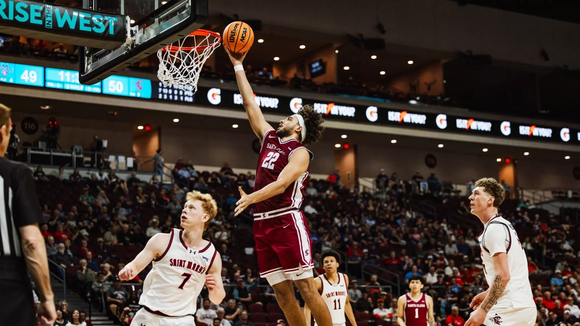 SCU player lays up a shot