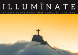 Christ the Redeemer statute in Rio de Janeiro photographed at sunrise with fog below.