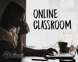 Person sipping coffee at a desk.