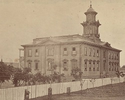 Historic photo of fence around SCU campus. 