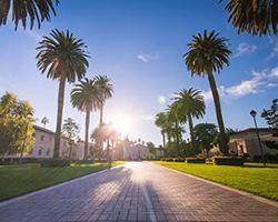 A view up Abby Sobrato Mall looking toward the Mission Church at sunset.