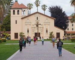 Student walking in front on Mission Church.