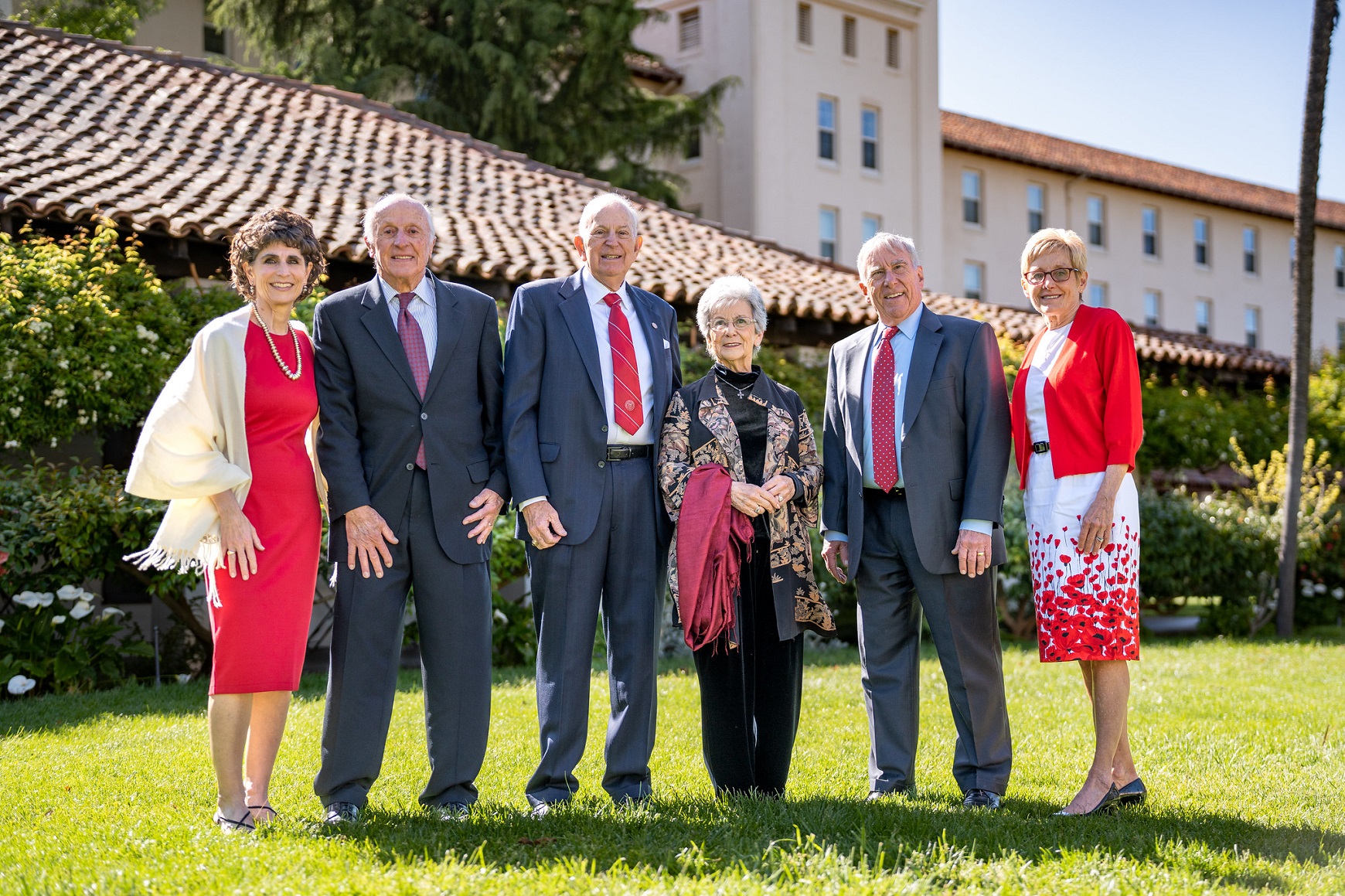 Six people standing together in the Mission Gardens.