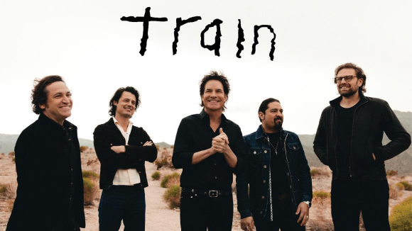 Five men in black casual clothing. Text above them reads