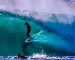 Surfer riding a wave.