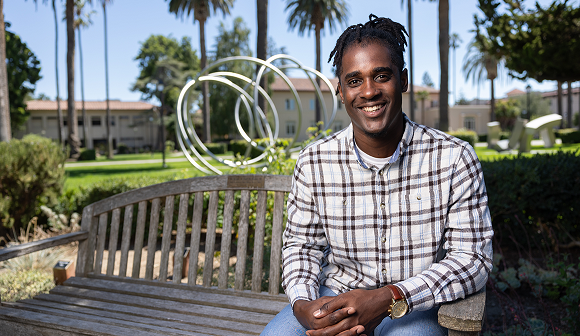 Man sitting on a bench.