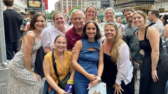 Group of people posing for a photo.