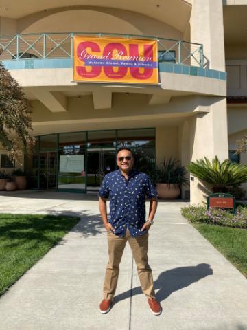 Franco Finn standing in front of SCU Vari Hall