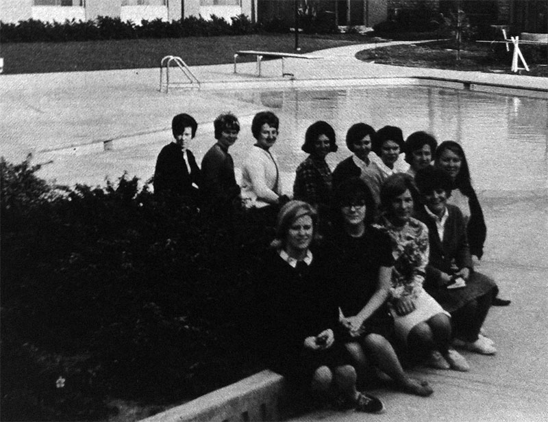 A group photo labeled 1965 WRA with individuals posing outdoors.