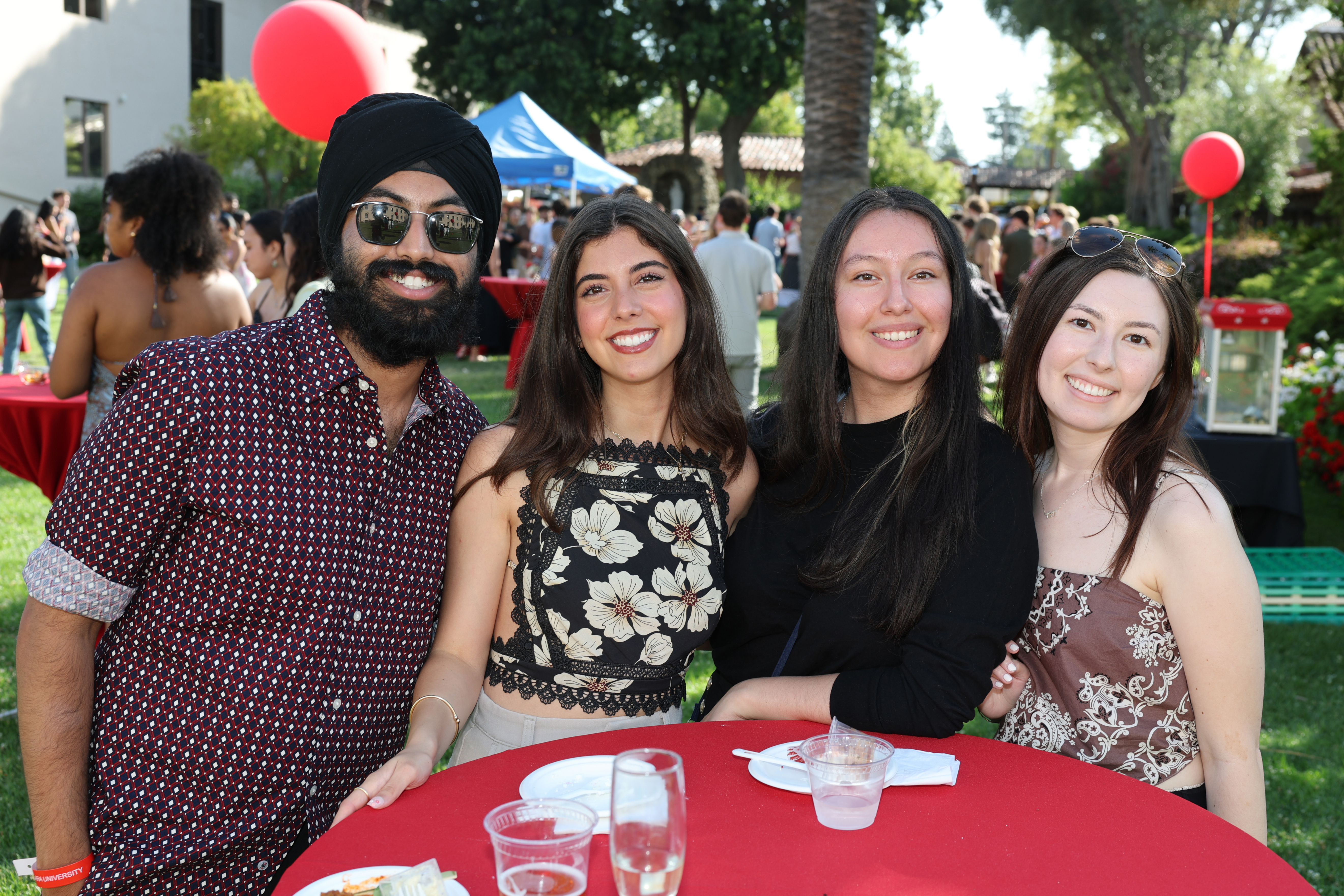Seniors at a table enjoying refreshments at the Class of 2025 Senior Toast