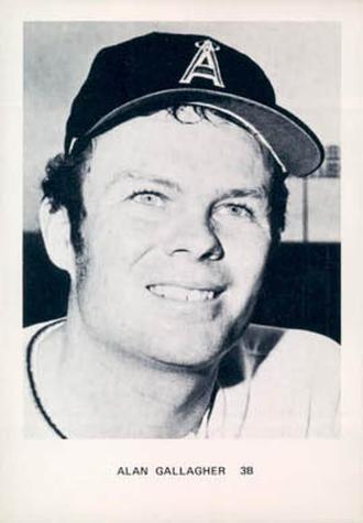 Black and white photo of Alan Gallagher wearing a baseball cap.