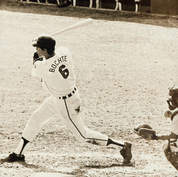 Bruce Bochte swinging a bat during a game, 1972.