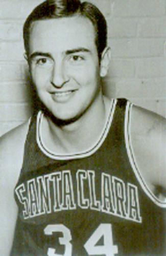 Black and white image of Bud Ogden in a basketball jersey.