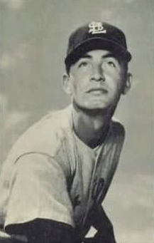 A baseball player in uniform, titled Duane Pillette.