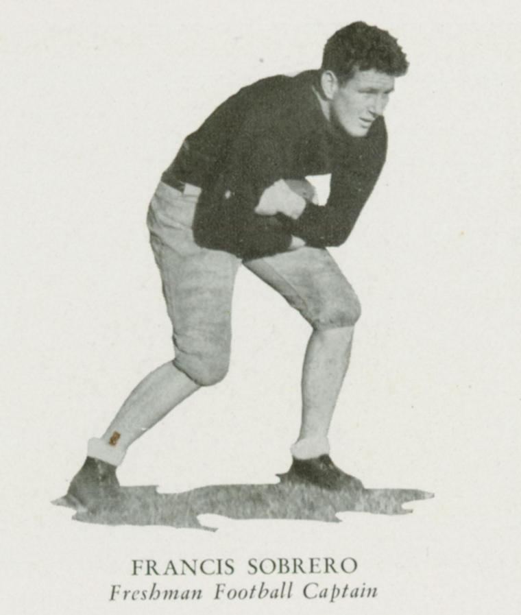 Black and white image of Frank Sobrero in a football stance.