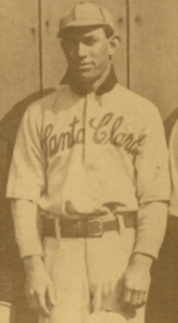 A sepia-toned photo of a baseball player in uniform.