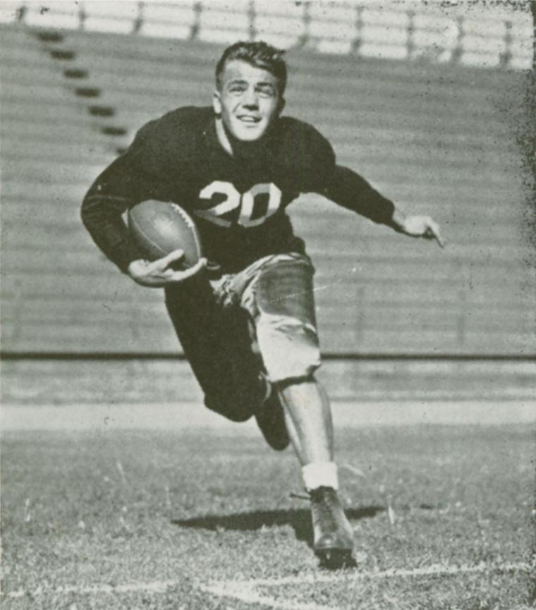 A football player wearing number 24 running with the ball in hand.