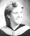 A black-and-white portrait of Jennifer Sneeringer (Fechner) HOF in graduation attire.