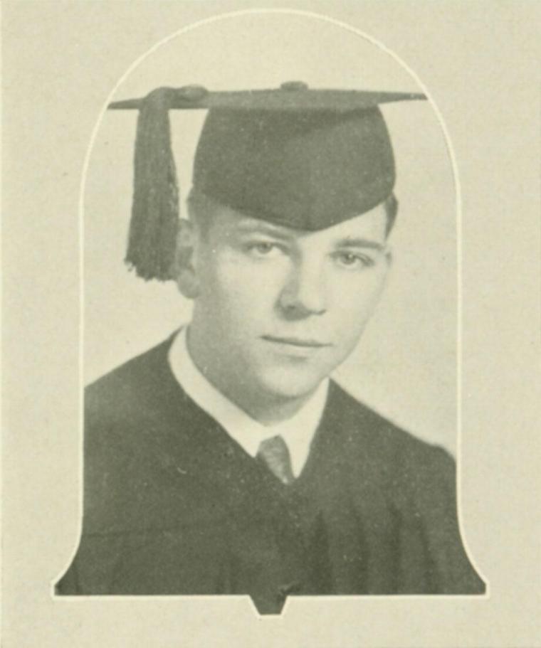 A young person wearing a graduation cap and gown.