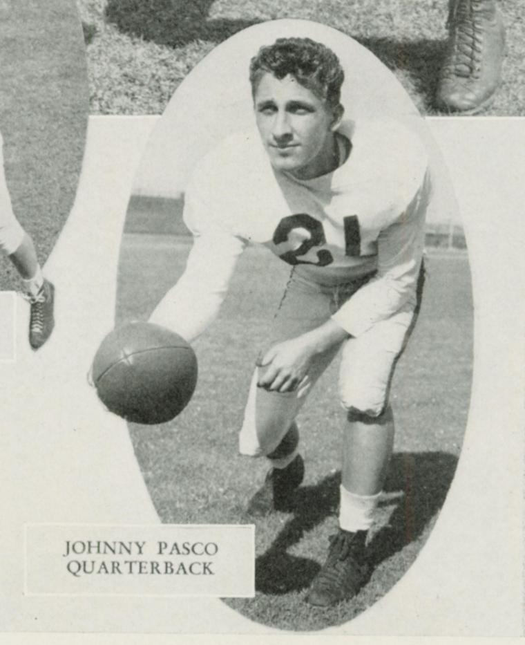 A vintage football player crouching with a football. Text: JOHN PASCO 1952 COLUMBIA.