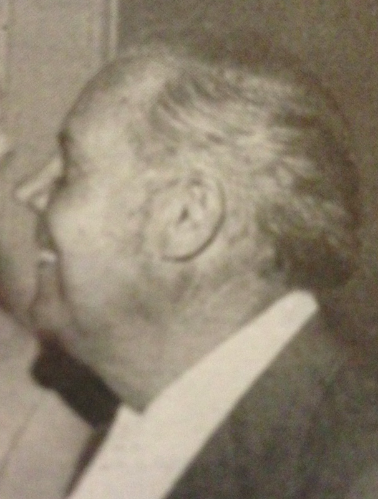 Black and white photo of a person in profile view.