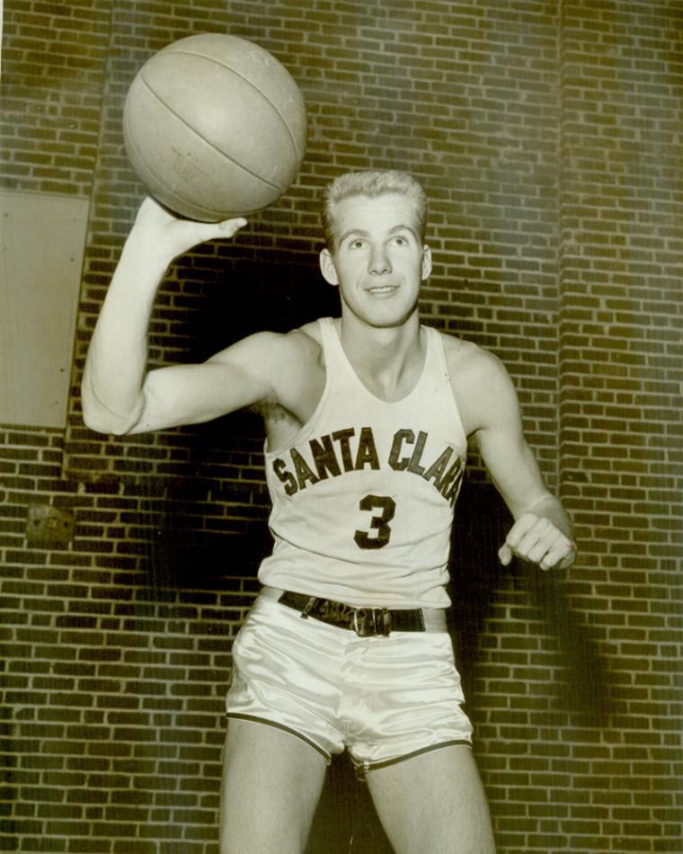 A basketball player holding a basketball in a jersey numbered 3.