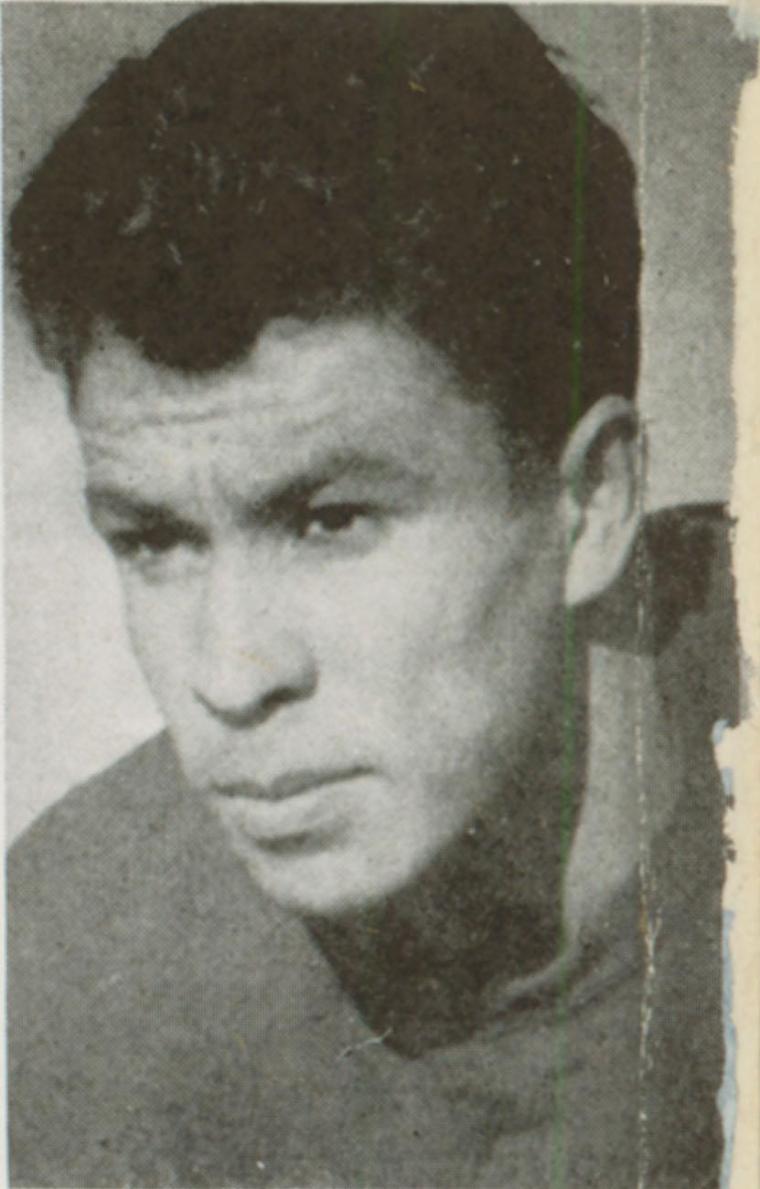 Black and white portrait of a man in 1939.