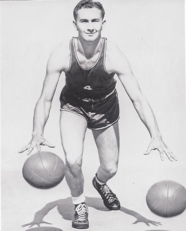 A drawing of a basketball player with two balls in hand.