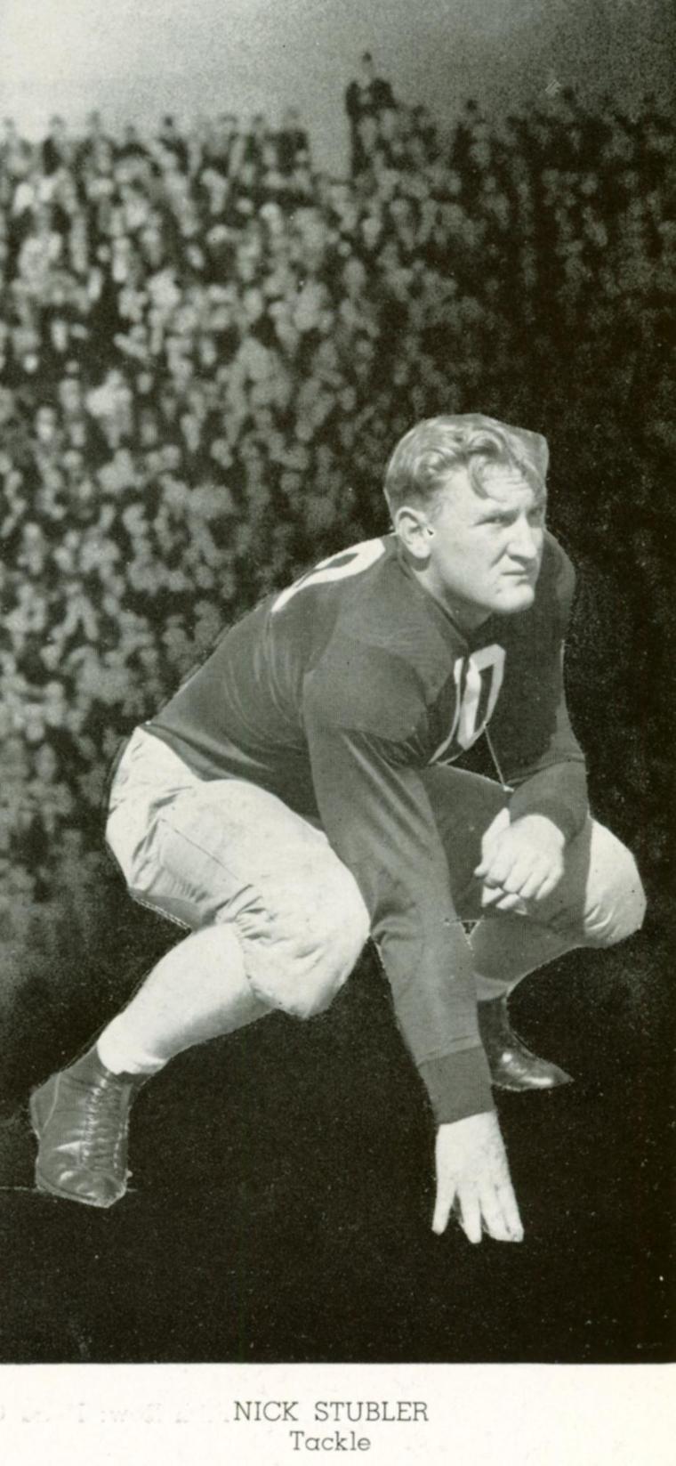 Black-and-white image of Nicholas Stubler in a football uniform, 1940.
