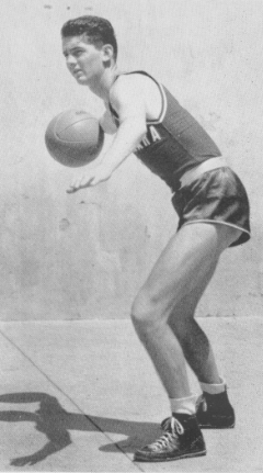 Black and white photo of a basketball player preparing to shoot.