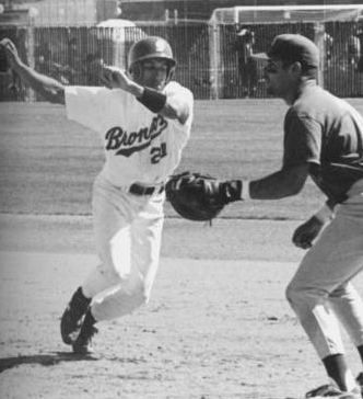 Black and white photo of two baseball players during a game.