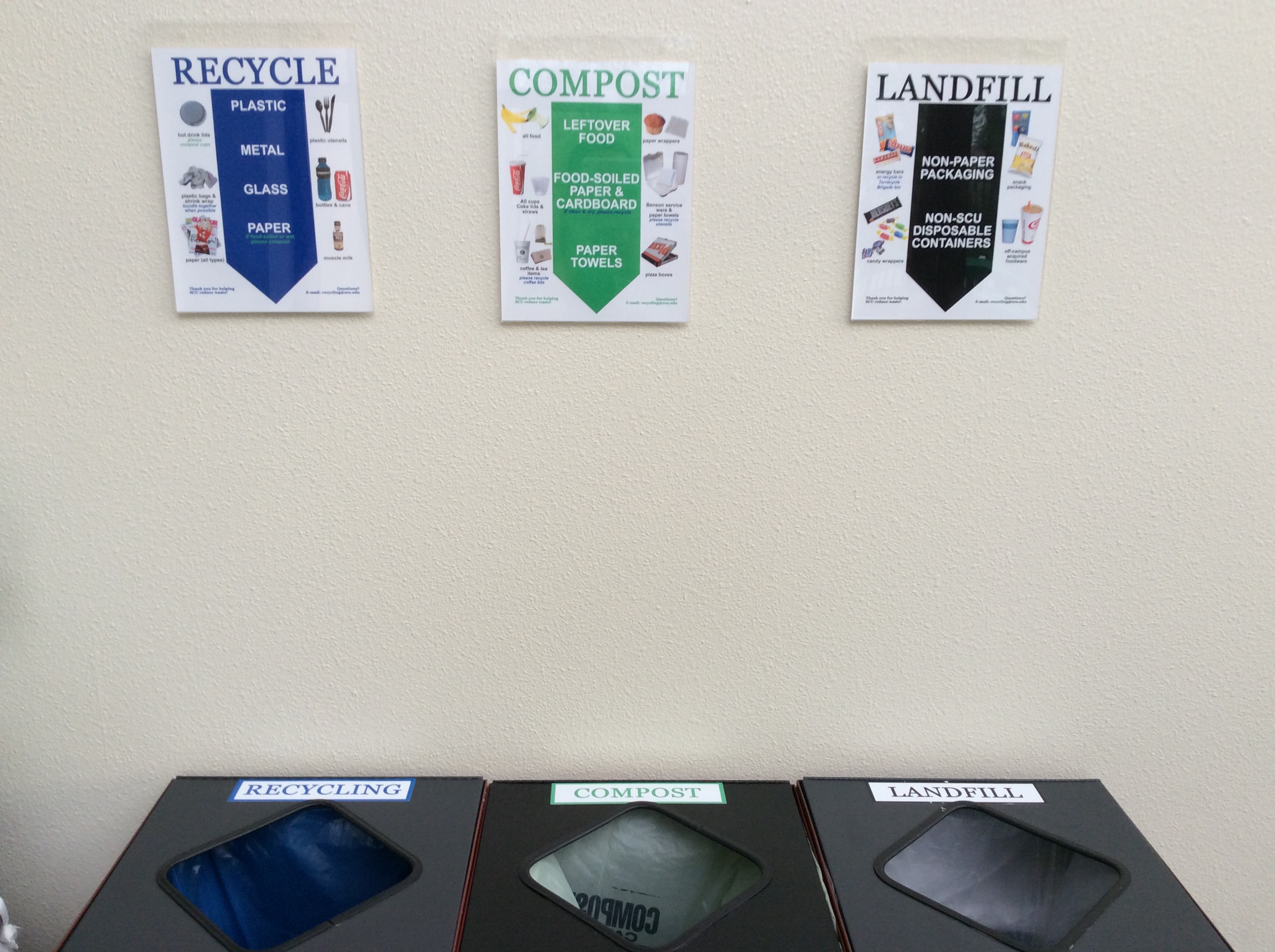 Three labeled bins for recycling, general waste, and paper disposal. image link to story