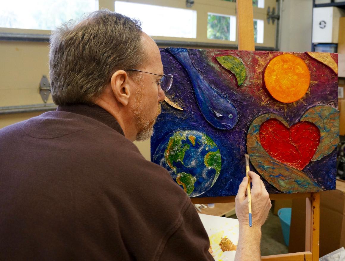 Dennis Jacobs paints in response to Laudato Si