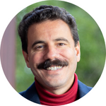 Headshot of a smiling person named Dylan.