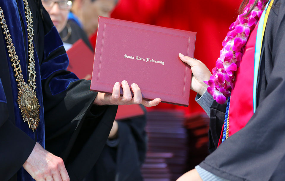 diploma cover hand off 