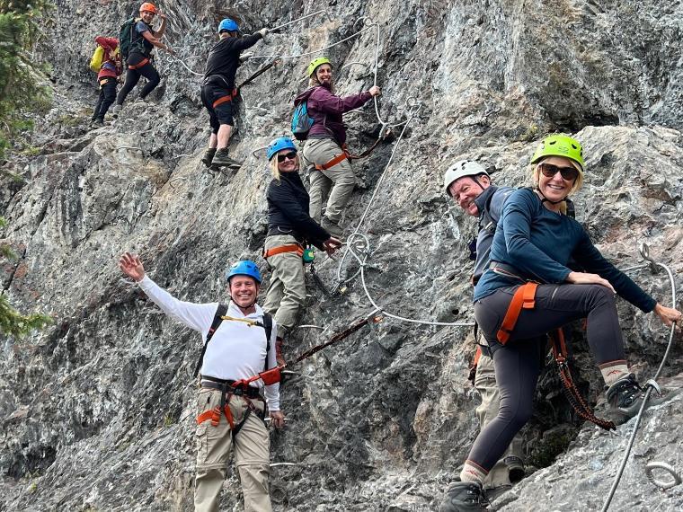 Fellows members rock climbing in Banff
