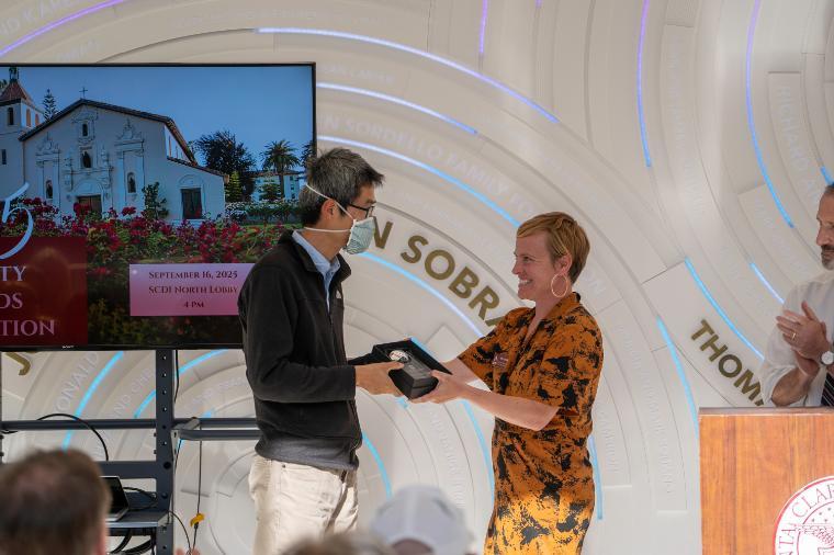 Decorative; On Shun Pak receiving an award at the Faculty Awards Ceremony