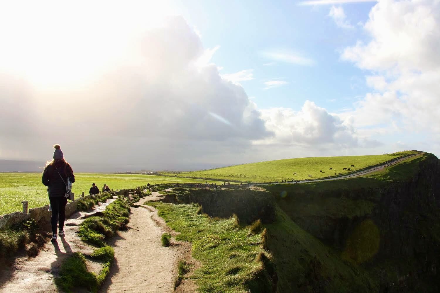 This photo was taken at the Cliffs of Moher in Ireland. We were extremely lucky to miss the rainfall by a half hour, clearing up to this beautiful light.